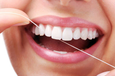 Чистите зубы зубной щеткой и нитью
